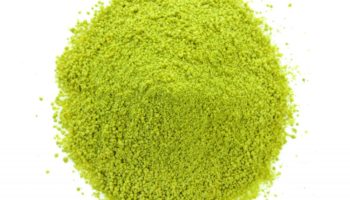 dry tea powder on white background
